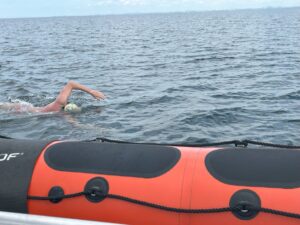 ben taylor crossing a channel during a swim event
