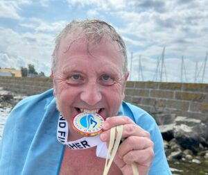 swimöresund finisher medal Ben Taylor